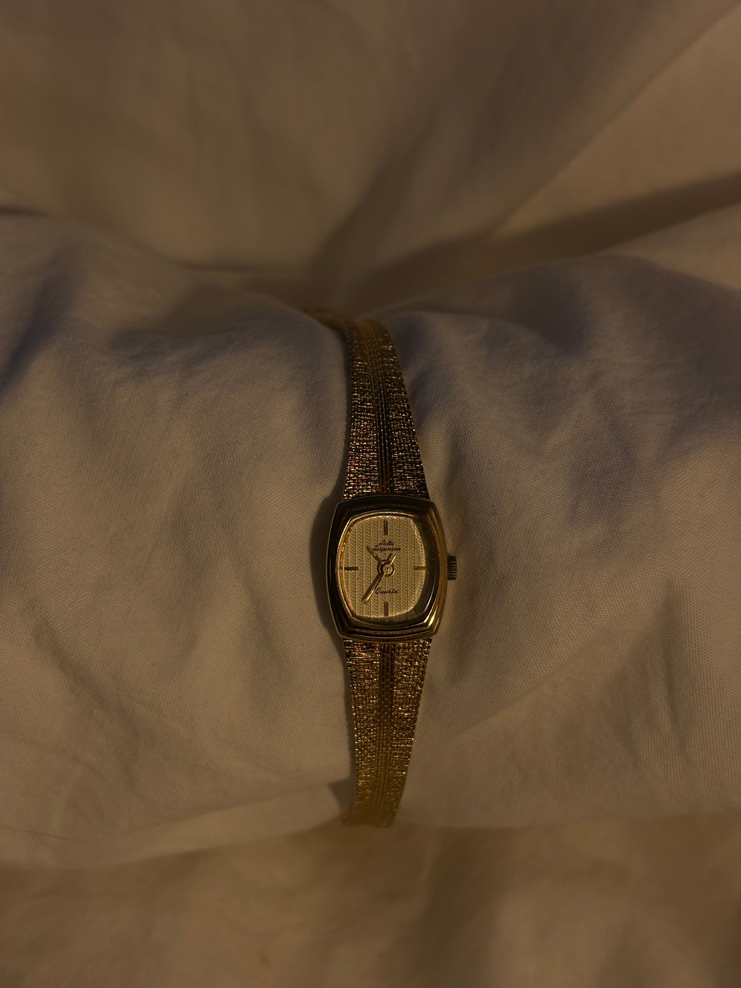 Dainty gold watch