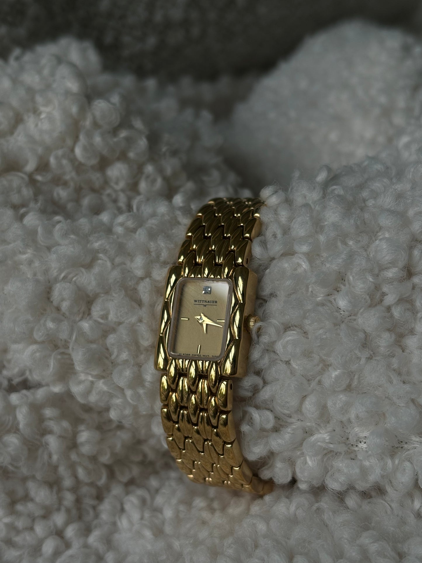 Gold Wittnauer yellow face watch with diamanté embedded