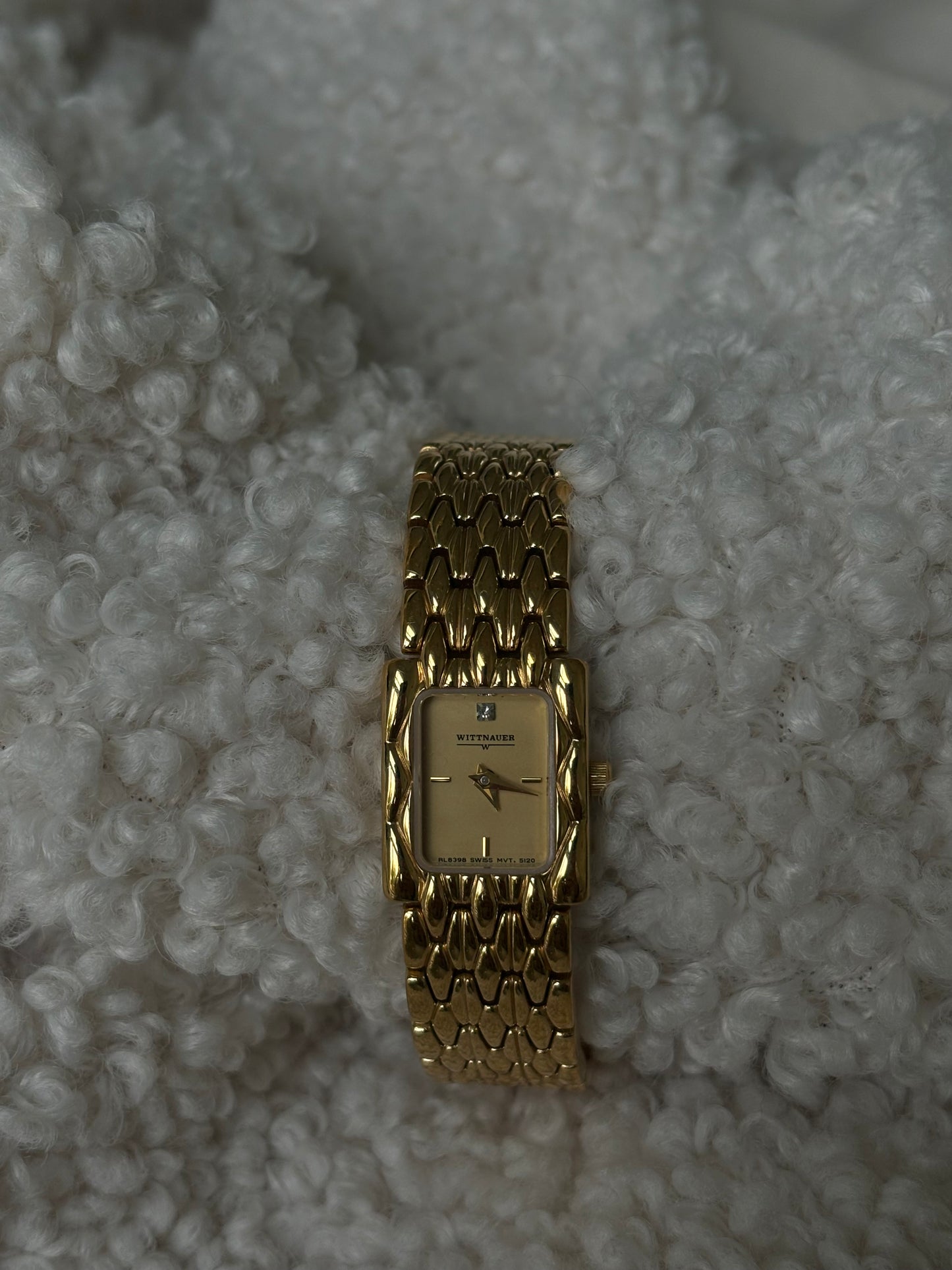 Gold Wittnauer yellow face watch with diamanté embedded